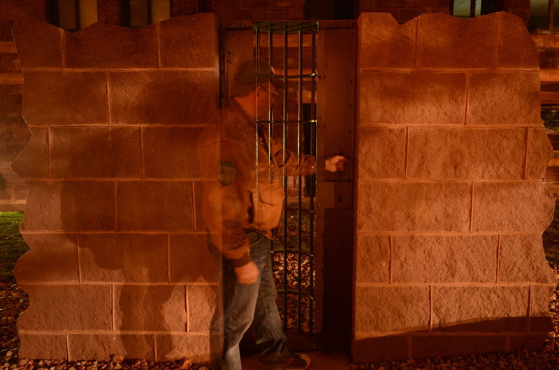 casual clothing, one person, burglar, men, full length, occupation, guard, night, wall, architecture, real people, working, wall - building feature, indoors