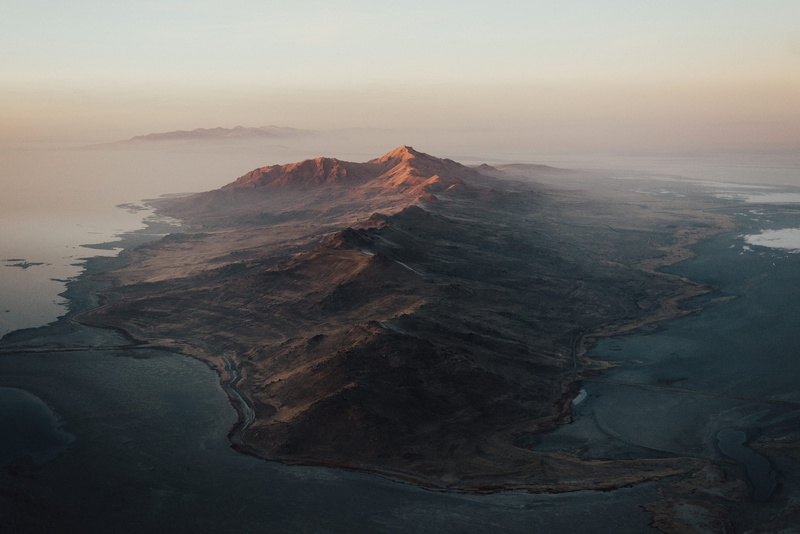 volcanic crater, no people, mountain, daytime, geology, nature, solid, surrounded, body, non-urban scene, salt, island, tranquility, bleak, rock, water