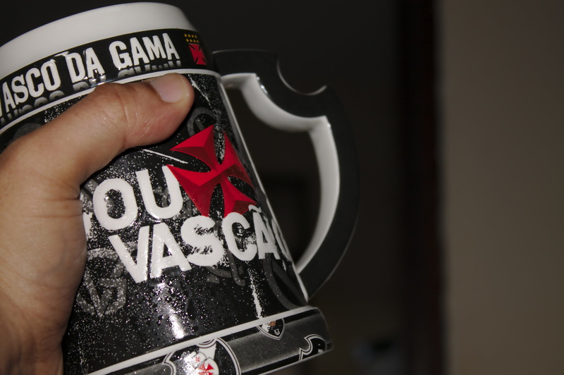 human finger, human hand, creativity, text, human body part, supporter, carioca team, indoors, real people, mug, vasco da gama, finger, focus on foreground