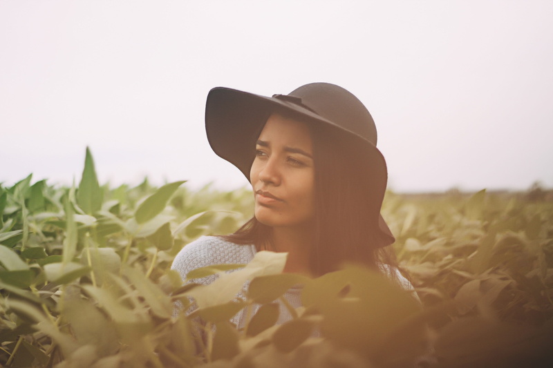 field, person, contemplation, sky, fields, growth, model, brown hat, brunette hair, landscape, beautiful woman, daytime, sunshine, portrait, brown hair