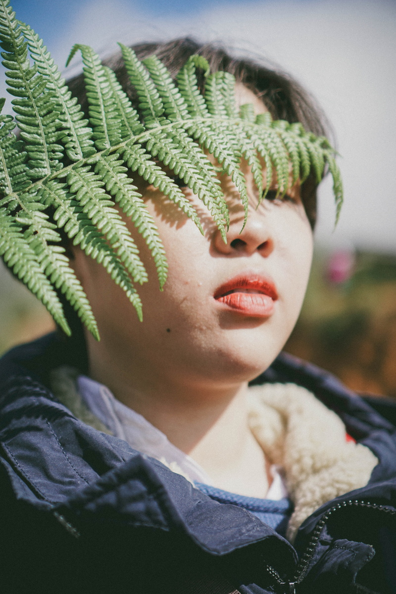 flower, botanical leaf, botanic, focus on foreground, 5K, covered, leaf, hidden, human, close-up, fern, lip, portrait, mimosa, leisure activity, hair