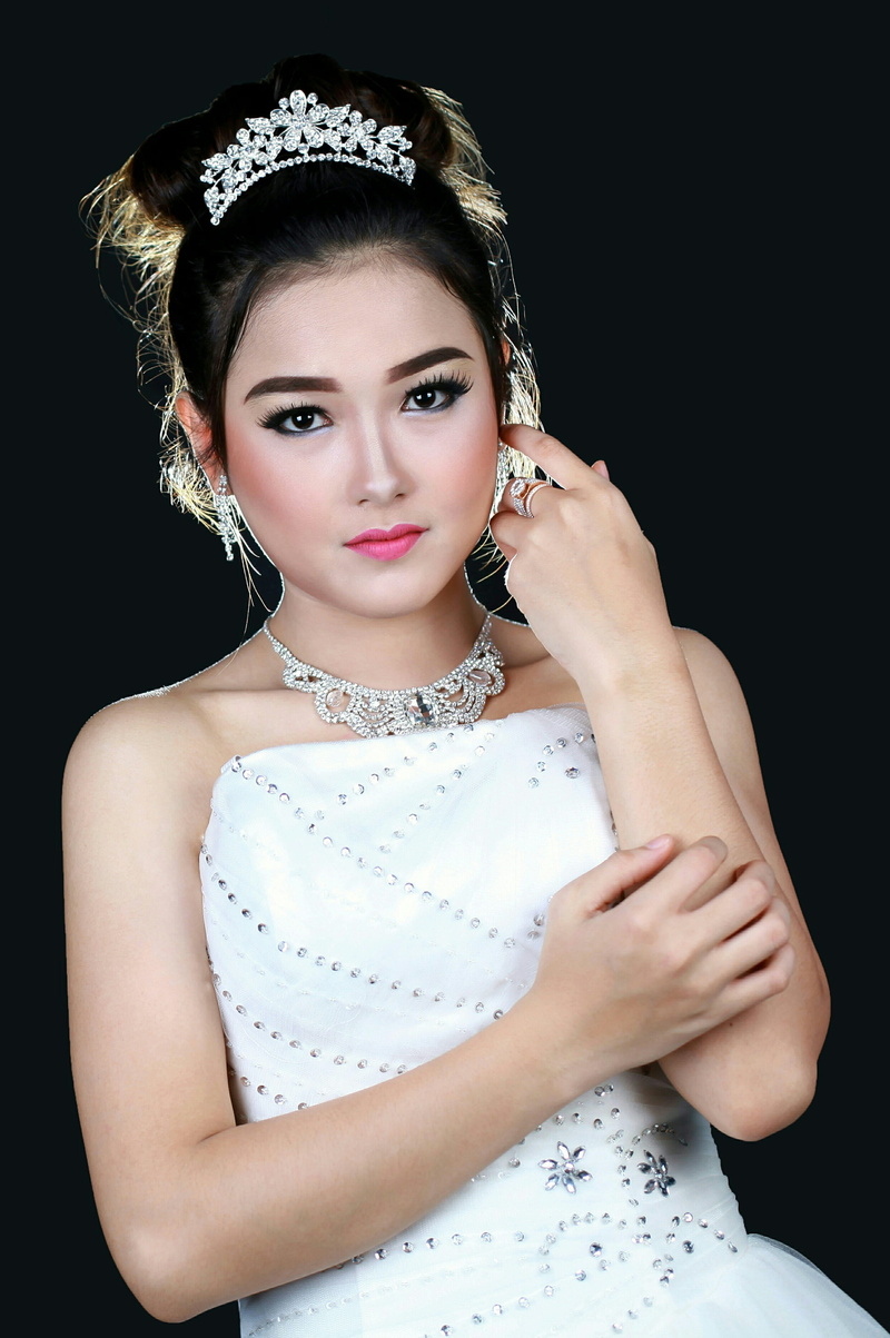 looking at camera, close up, touching, waist up, jewelry, young women, front view, indonesian women, clothing, black background, face, potrait, portrait