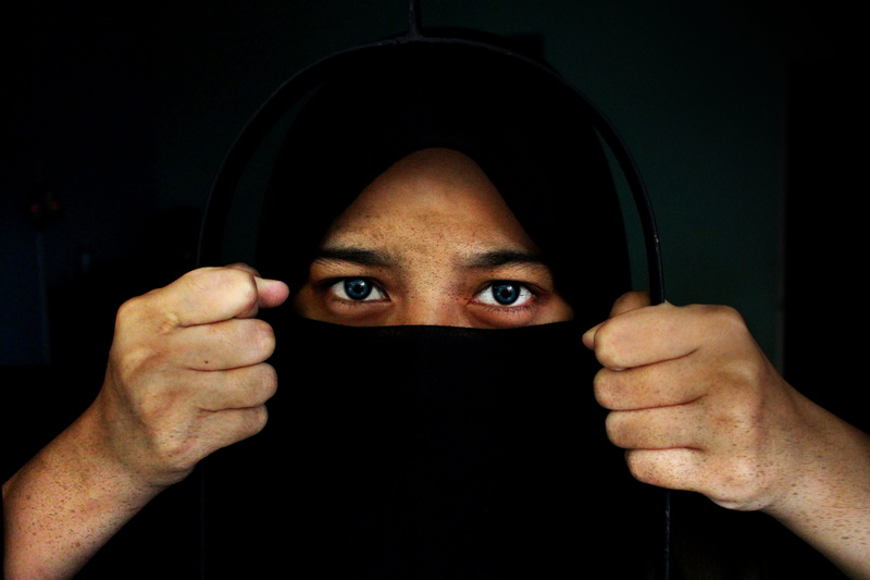 hand, front view, body part, human hand, holding, human face, close-up, portrait, human body part, alone, indoors, looking at camera, potrait, headshot