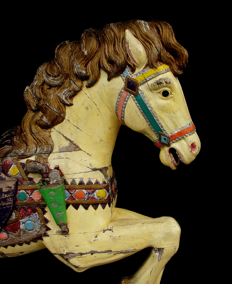 carousel, indoors, animal representation, brown, merry-go-round, art and craft, dark, one animal, fun, domestic, creativity, animal themes, cut out, mammal