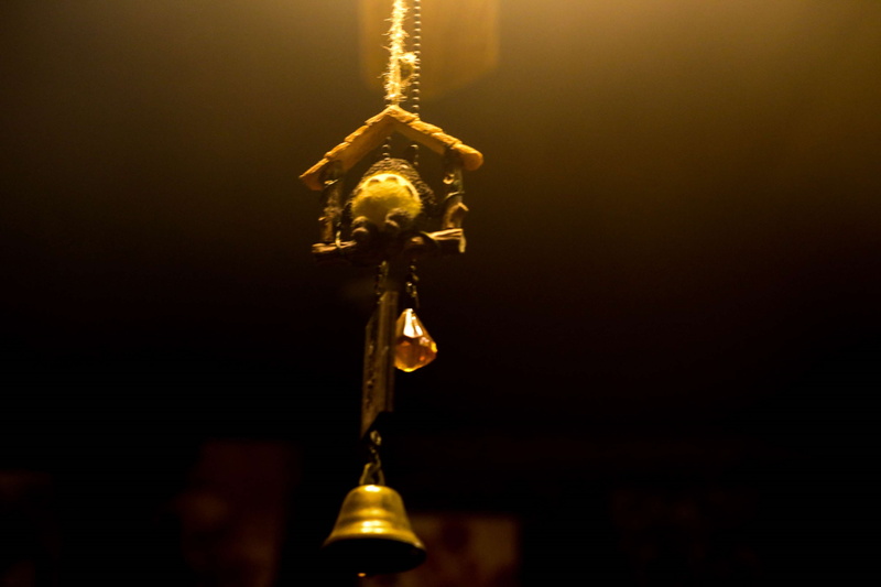 gold colored, design, hanging, studio shot, copy space, trophy, close-up, single object, indoors, low angle view, aeolian bells, focus on foreground, illuminated