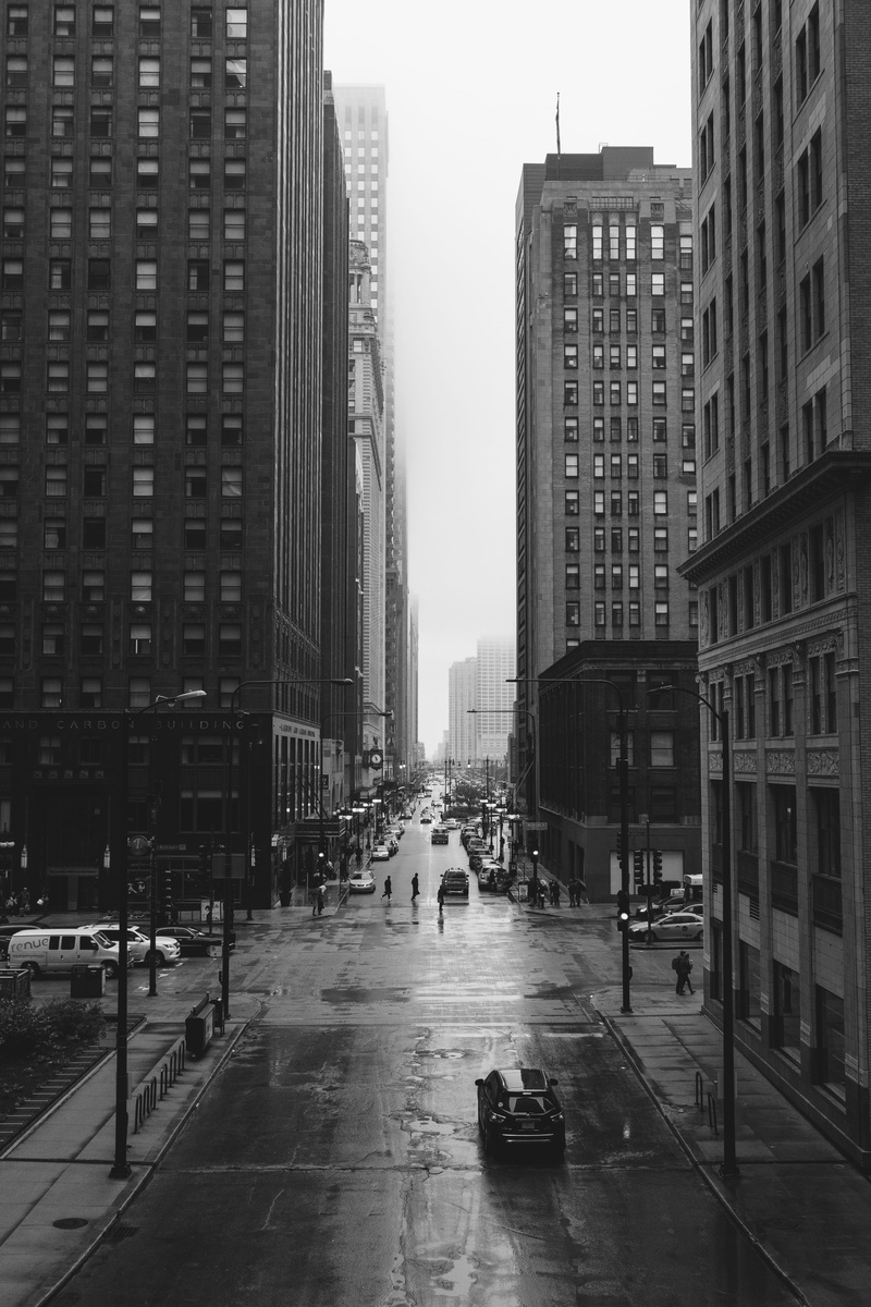 mode of transportation, grayscale, urban Scene, office Building, car, near, manhattan - New York City, motor vehicle, outdoors, street, skyscraper, city Life