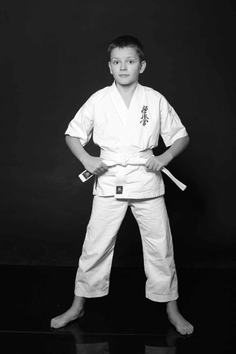 studio shot, young adult, black background, young women, martial arts, confidence, looking at camera, clothing, lifestyles, teen, kimono, boy, karate, schoolboy