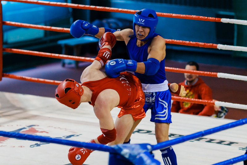 boxing gloves, group of people, athletes, sports equipment, strength, action, boxing, wear, head wear, rivalry, motion, two, blue, helmet, cooperation