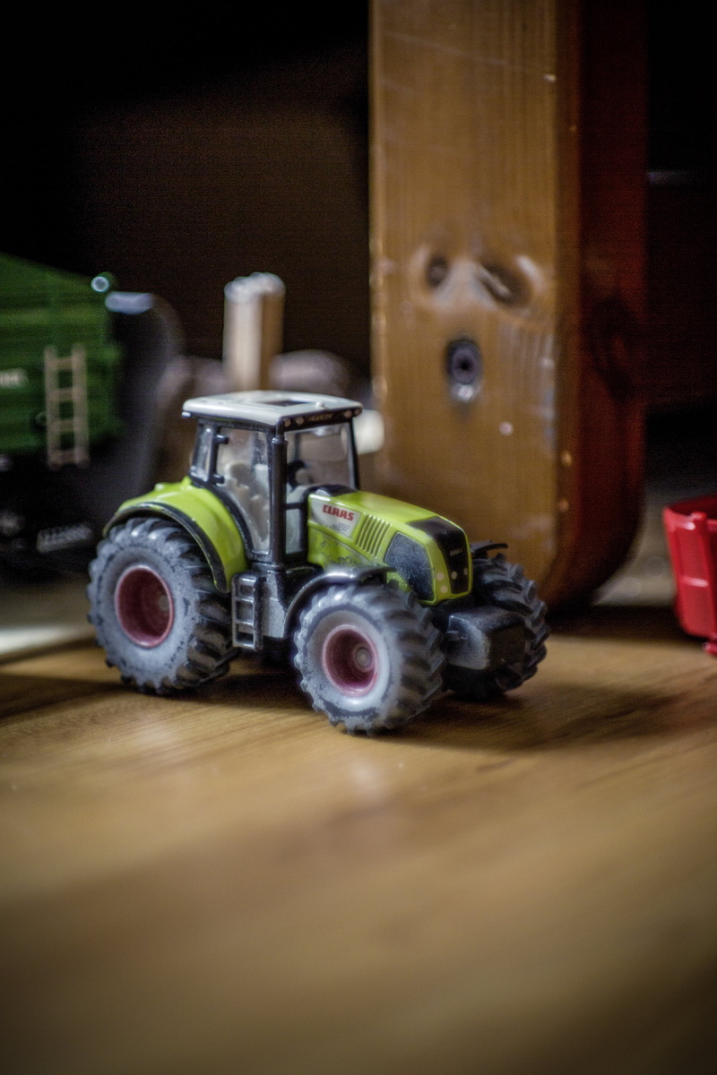 5K, technology, playful, metal, game, blur, machinery, wooden, flooring, imagination, still life, table, mode of transportation, tractor, close-up, action