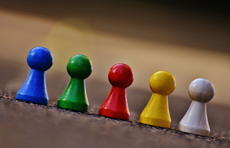 indoors, variation, strategy, wood, play stone, order, assorted, board game, placed, community, colorful, leisure games, color, poons, play, close-up, colored background