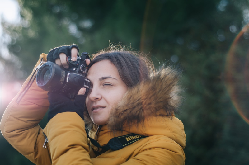 grey, photographing, real people, face, portrait, lifestyles, activity, young adult, camera, warm clothing, winter, nikon, sun, outdoors, photographer