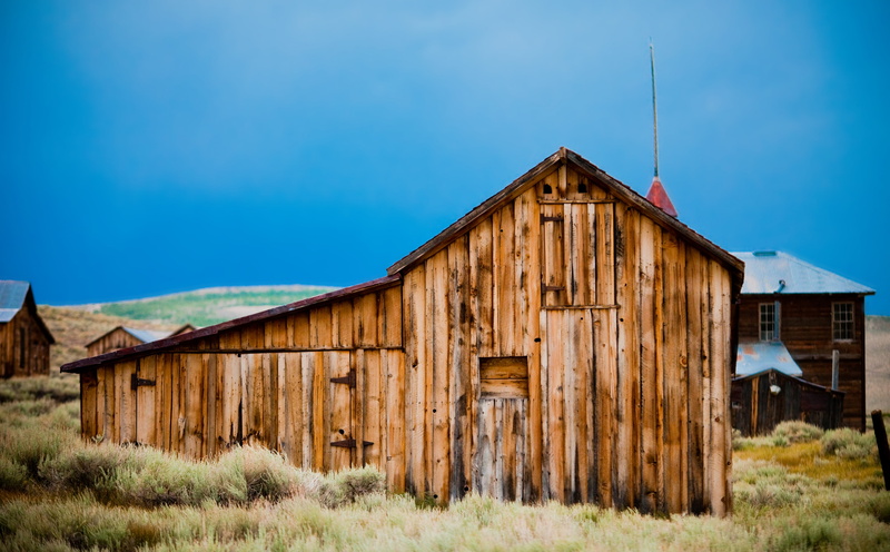 misplaced, outdoors, clear sky, building exterior, built structure, agricultural building, house, farm, wood - material, land, nature, hut, no people, cabin
