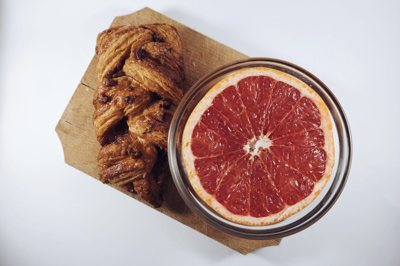 food and drink, orange, indoors, food, no people, ready-to-eat, freshness, dessert, snack, wood, tasty, table, slice, citrus fruit, directly above, close-up