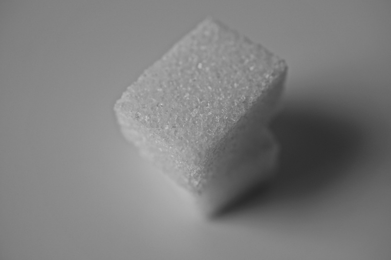 blur, single object, teabag, purity, no people, geology, monochrome, candy, shadow, water, drop, close-up, closeup, Sugar, shape, Cubes, wet, black background