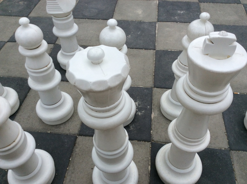 knight - chess piece, leisure activity, team, chess board, protection, meeting, corporate, development, checked pattern, no people, close-up, board game