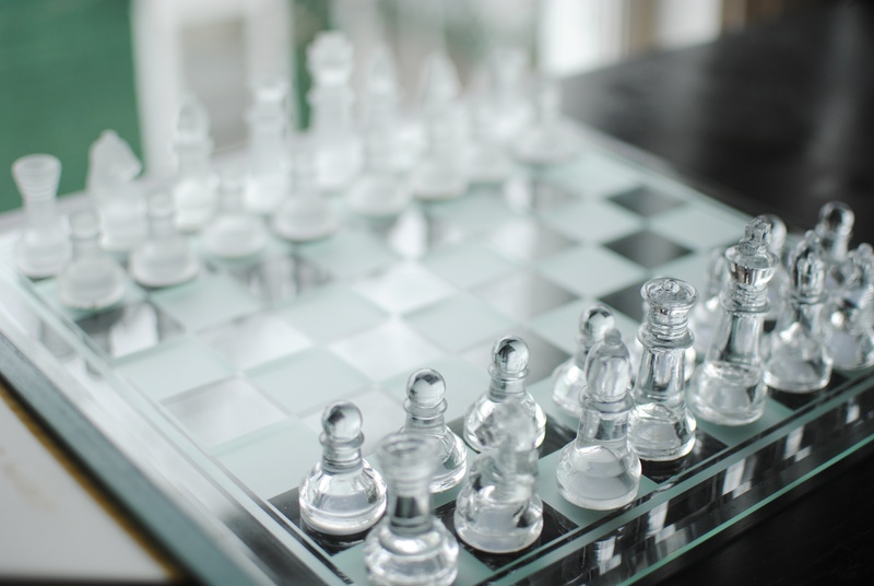 leisure activity, board games, glass - material, absence, focus on foreground, transparent, large group of objects, board game, arts culture and entertainment