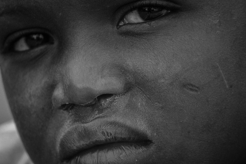 adult, kid, africa, front view, boy, 5K, greyscale, indoors, alone, lifestyles, portrait, human face, african, pretty boy, photo, poverty, one person