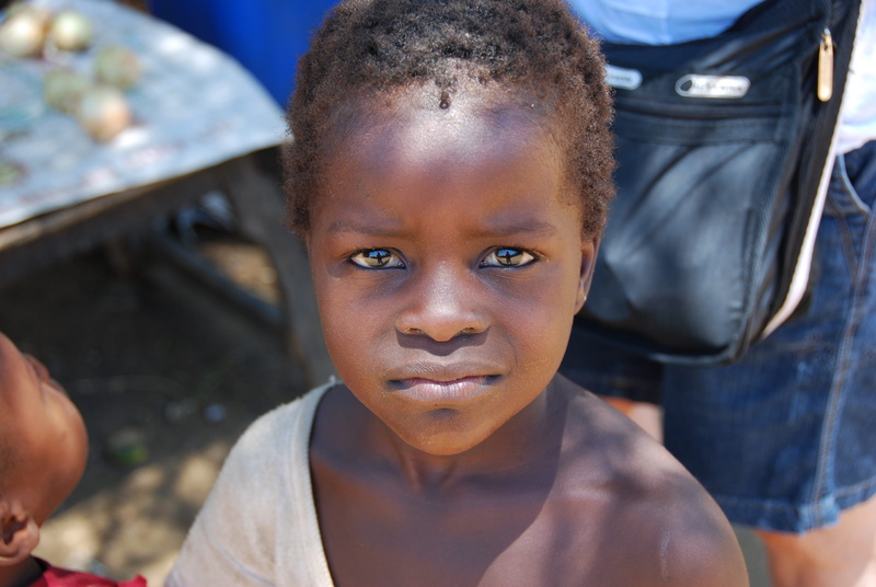 boy, looking at camera, women, lifestyles, face, girls, wearing, child, african Ethnicity, boys, human body part, close-up, red shirt, outdoors, headshot