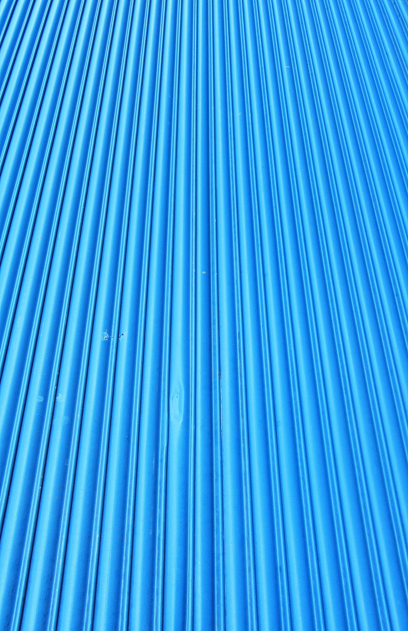corrugated, grille, aluminium, painted metal, full frame, outdoors, arrow, no people, blue, plastic, fence, industrial, symbol, 2K, backgrounds, lines