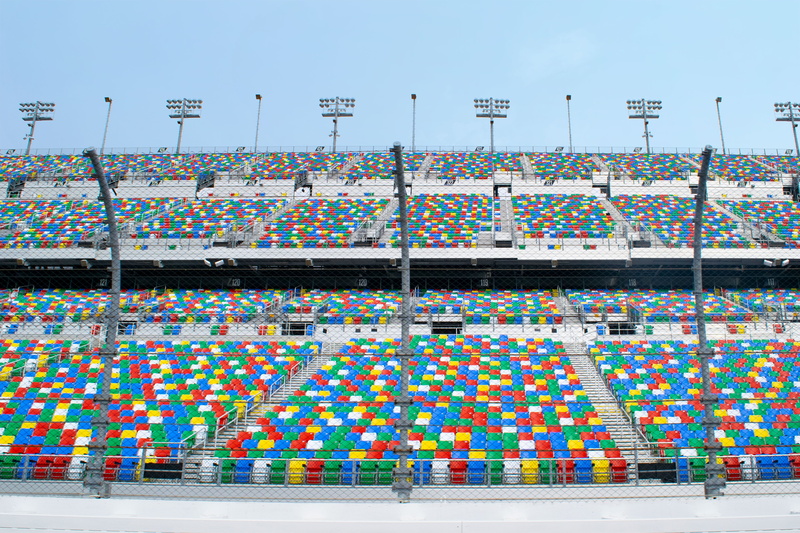 architecture, nascar, protection, high angle view, in a row, outdoor, large group of objects, multi colored, empty, speed, built structure, safety, choice
