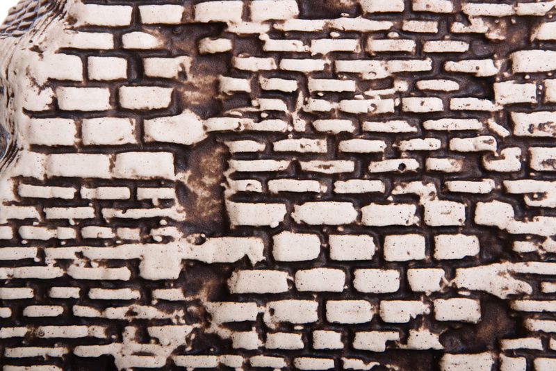 large group of objects, wall - building feature, solid, wood - material, stone, surface, rubble, brown, blotch, abundance, blocks, stonewall, day, texture