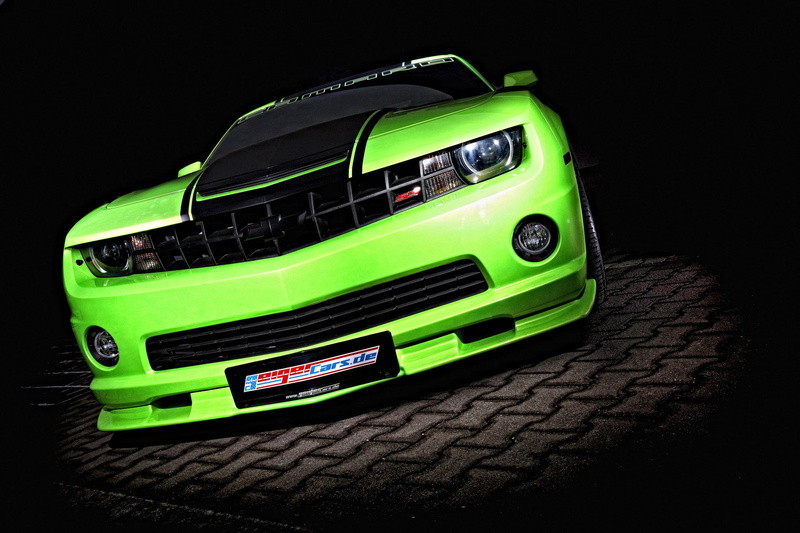 sport, land Vehicle, single object, Chevrolet, no People, side View, plastic, selective focus, power, Geiger, new, shiny, front View, green color, black background