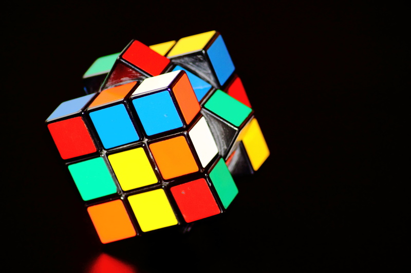 shape, colorful, black background, block shape, strategy, close-up, play, cube shape, toy, geometric shape, multi colored, studio shot, design, concentration