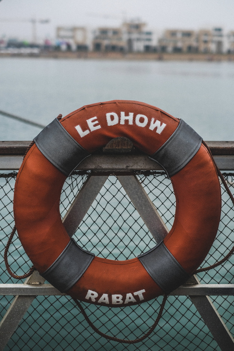 building, text, day, communication, architecture, security, building exterior, western script, water, nature, outdoors, lifebuoy, sport, life belt, board