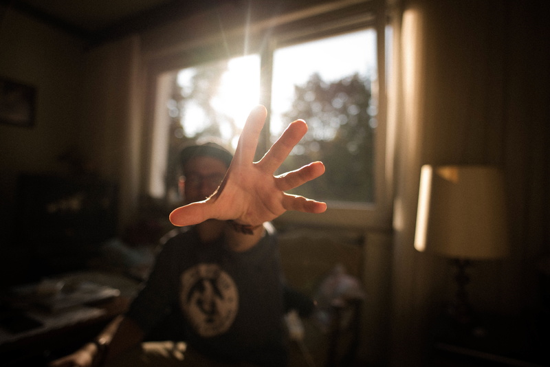 one person, guy, hands, hat, house, looking through window, hand raised, bracelets, human body part, reflection, blur, cap, 5K, room, finger, glass, gesturing