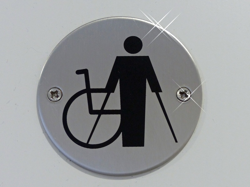 road sign, disabilities, communication, indoors, warning sign, circle, person, 2K, disabled, representation, male likeness, sign, safety, geometric shape