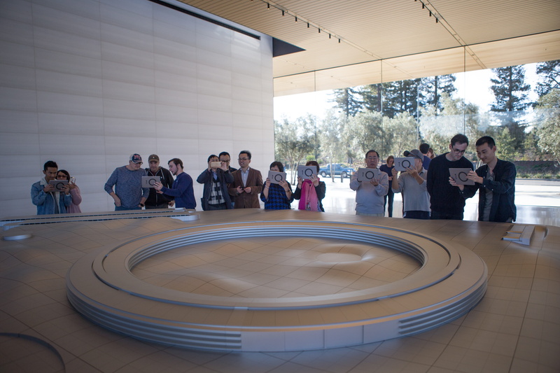 apple, apple park, large group of people, indoors, stage, real people, crowd, women, communication, silicon valley, architecture, adult, front view, cupertino
