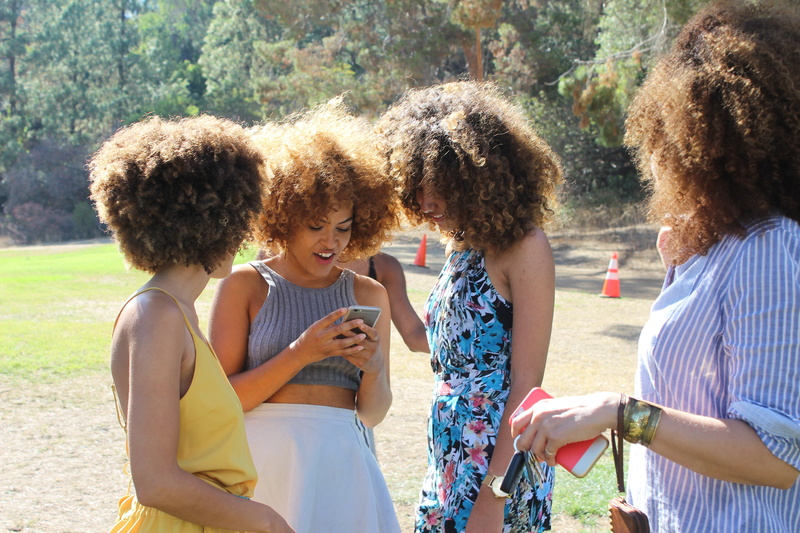 daytime, four, young adult, sunlight, smiling, summer, hairstyle, 5K, black, apple, standing, african american, curly hair, green, communication, field