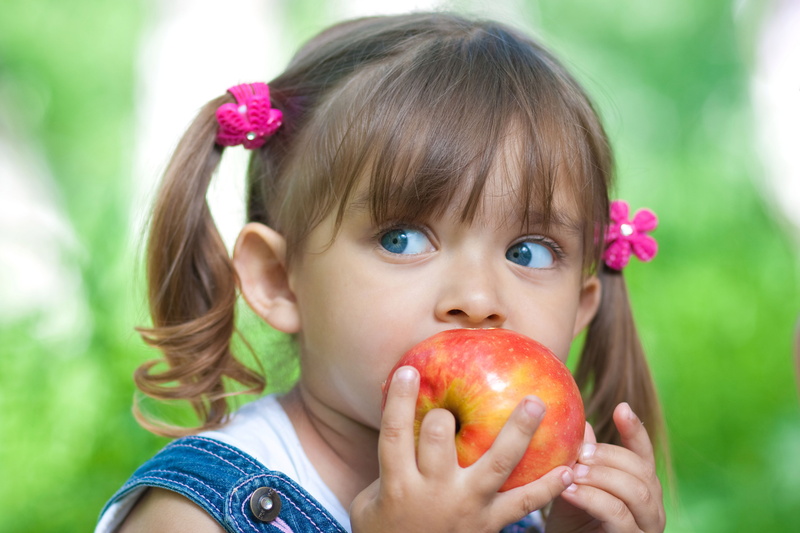 red, human Face, fruit, cute, innocence, baby, beauty, smiling, girls, ripe, healthy Lifestyle, food, small, hairstyle, focus on foreground, food and drink