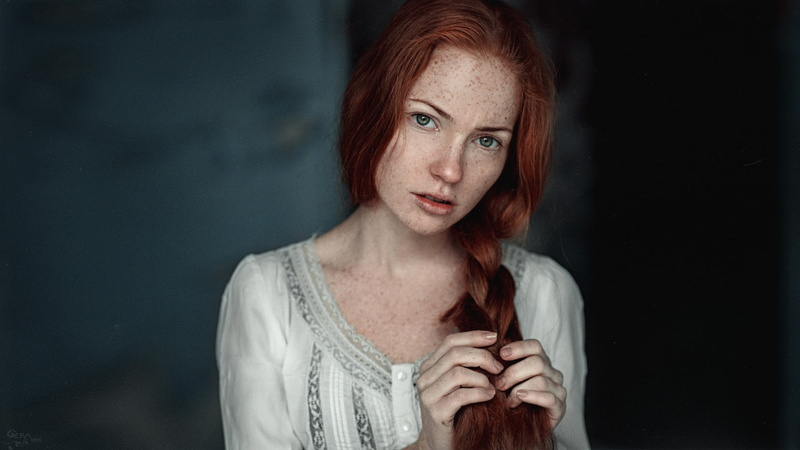 model, freckles, one person, sadness, 1080P, braids, looking, hairstyle, beautiful woman, looking at viewer, green eyes, indoors, beautiful people, headshot