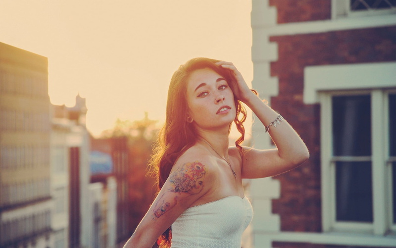 built structure, casual clothing, young women, s, leisure activity, architecture, women outdoors, tattoo, one person, lifestyles, outdoors, hairstyle, long hair
