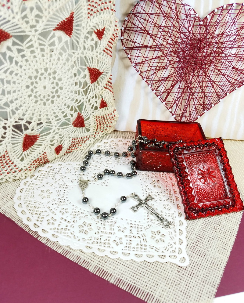 no people, embroidery, indoors, bow, pattern, celebration, doily, high angle view, table, still life, rosary, decoration, beads, Heart, jewelry box, 2K