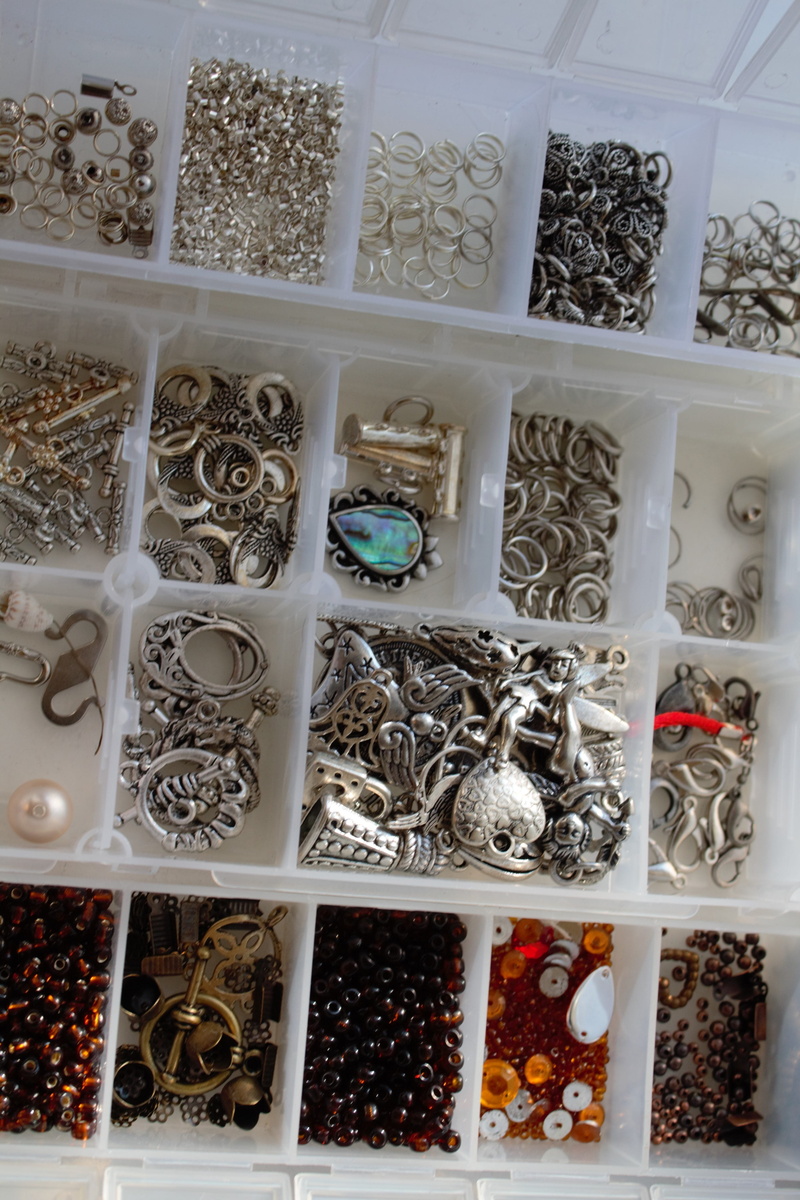 craftsmanship, full frame, plant, close-up, retail, hand made, shelves, jewelry, variation, indoors, no people, beads, choice, handicraft, still life, abundance