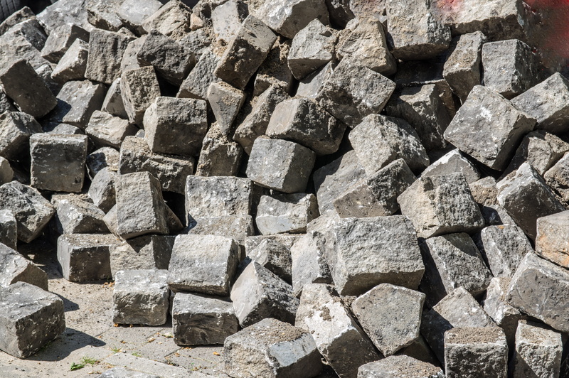 berlin patch, paving stones, rock, sunlight, solid, background, textured, no people, rock - object, large group of objects, block, concrete, texture, outdoors