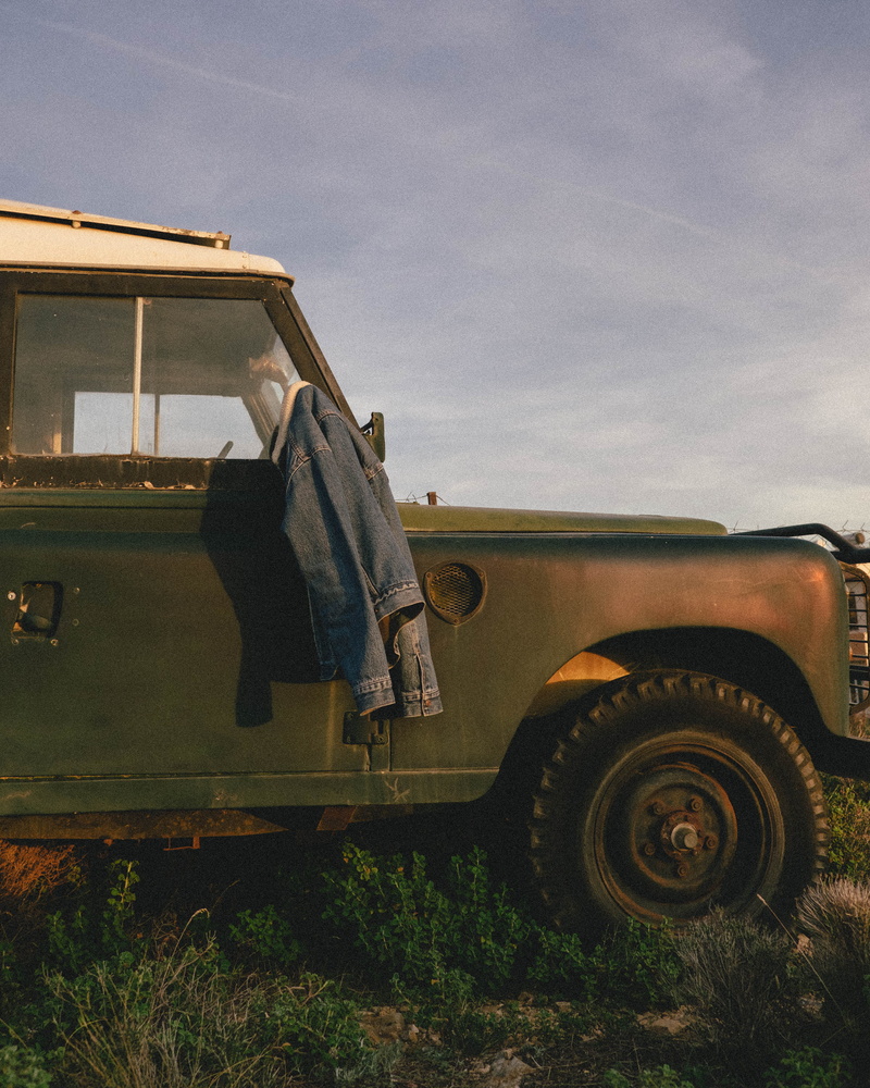sky, rusty truck, side view, retro styled, car, tire, rustic, land vehicle, truck, wheel, field, adventure, land rover, no people, machine, jacket, vehicle