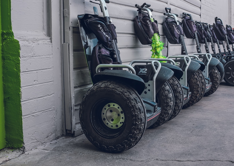 city, tire, stack, tourism, day, in a row, sight seeing, garage, rubber, container, neonbrand, wheel, abundance, large group of objects, street, tourist