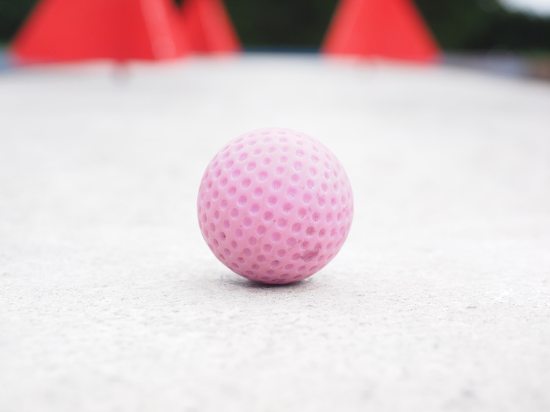 mini golf ball, skill game, activity, selective focus, rubber ball, golf ball, geometric shape, ground golf, precision sport, miniature golf, no people