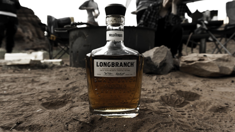 bottle, container, beach, refreshment, beer - alcohol, beverage, western script, whisky, no people, liquor, focus on foreground, outdoors, girl, communication