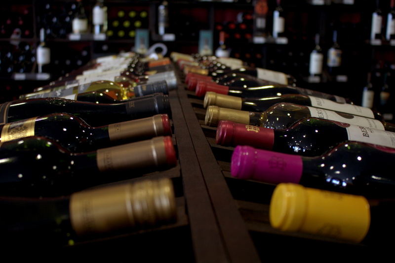 bottles, wines, nightlife, large group of objects, wine, beauty, wood - material, abundance, red wine, bottle, glass, rioja, refreshment, container, corks