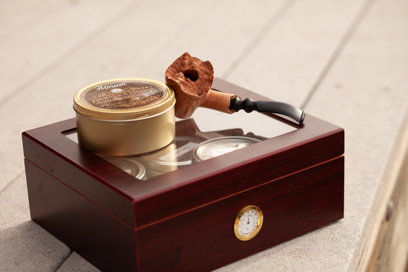 wood - material, focus on foreground, clock tower, grinder, humidor, cup, brown, hot drink, beverage, peterson, tea, cappuccino, food and drink, mountains