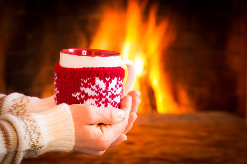 lifestyles, flame, heat - Temperature, sock, fireplace, hot, red, females, Cup, comfortable, holiday, women, sweater, close-up, adult, human Hand, focus on foreground