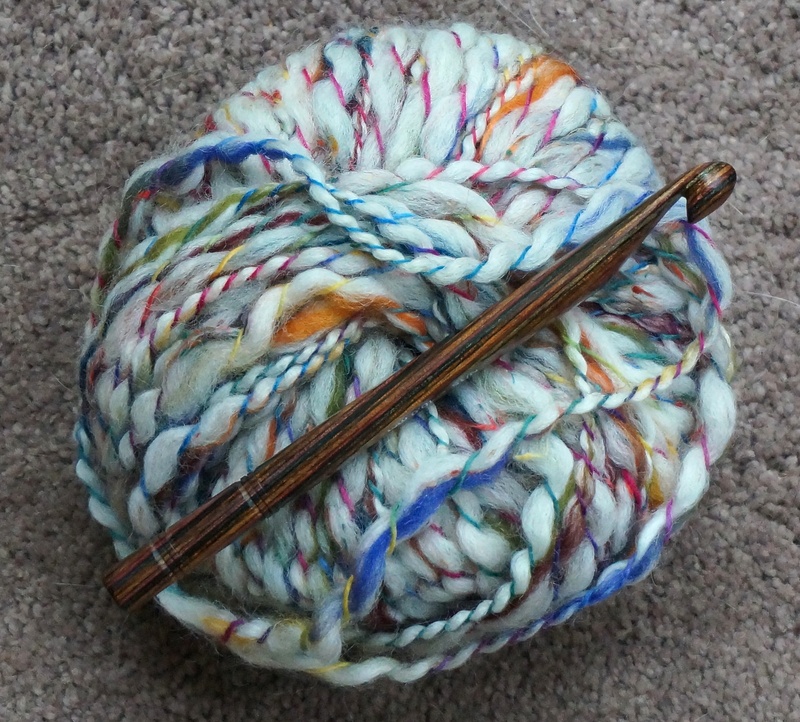 crochet, art and craft equipment, indoors, 2K, focus on foreground, multi colored, white, softness, craft, ball of wool, yarn, knitting needle, high angle view
