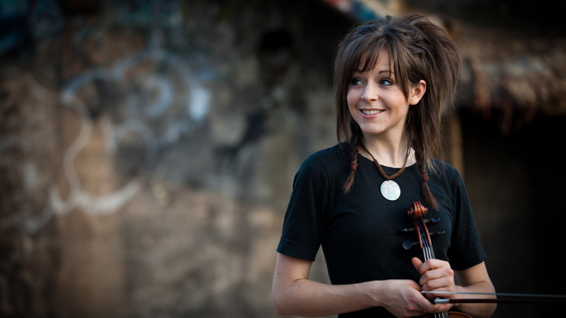 cheerful, emotion, 2K, violin, standing, hair, one person, waist up, smiling, holding, adult, looking at camera, bangs, brown hair, Lindsey Stirling, portrait