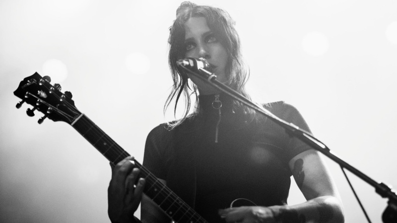 microphone, input device, waist up, arts culture and entertainment, young adult, singer, artist, musical instrument, Chelsea Wolfe, monochrome, hairstyle