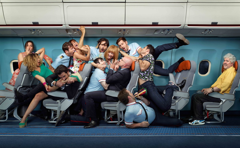 crowd, poster, happiness, smiling, group of people, mid adult women, seat, indoors, sitting, guys, emotion, crush, surprise, large group of people, the plane