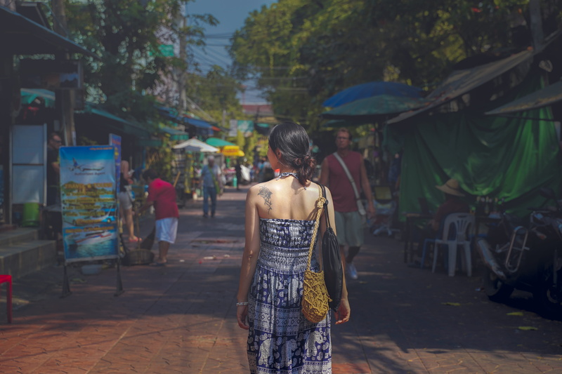 halter, market, bazaar, day, leisure activity, architecture, dress, portrait, clothing, outdoors, casual clothing, standing, person, path, stores, human